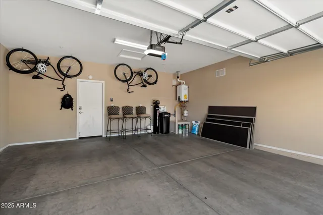 a front view of a building with small garden