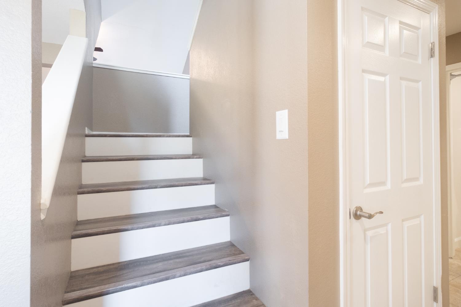 3147 Boulder Avenue Madera, CA 93637 - Photo 15 of 29 a view of staircase with white walls