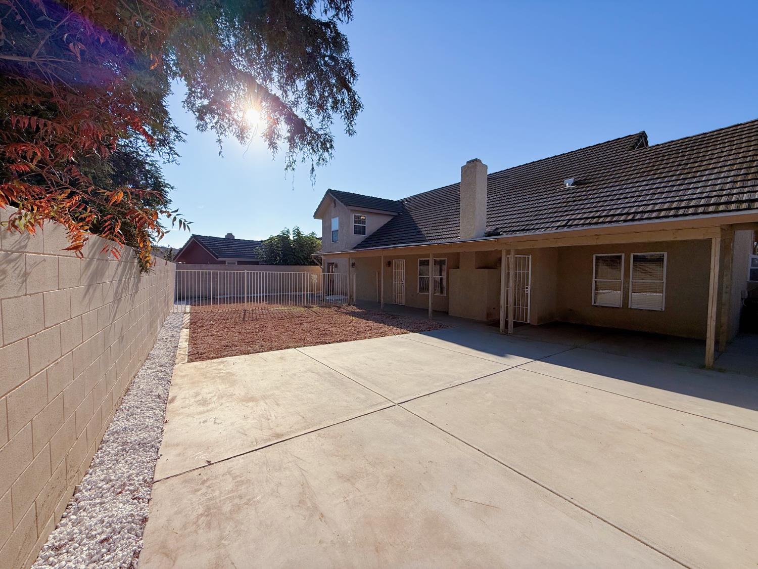 3147 Boulder Avenue Madera, CA 93637 - Photo 19 of 25 a view of a house with a large space