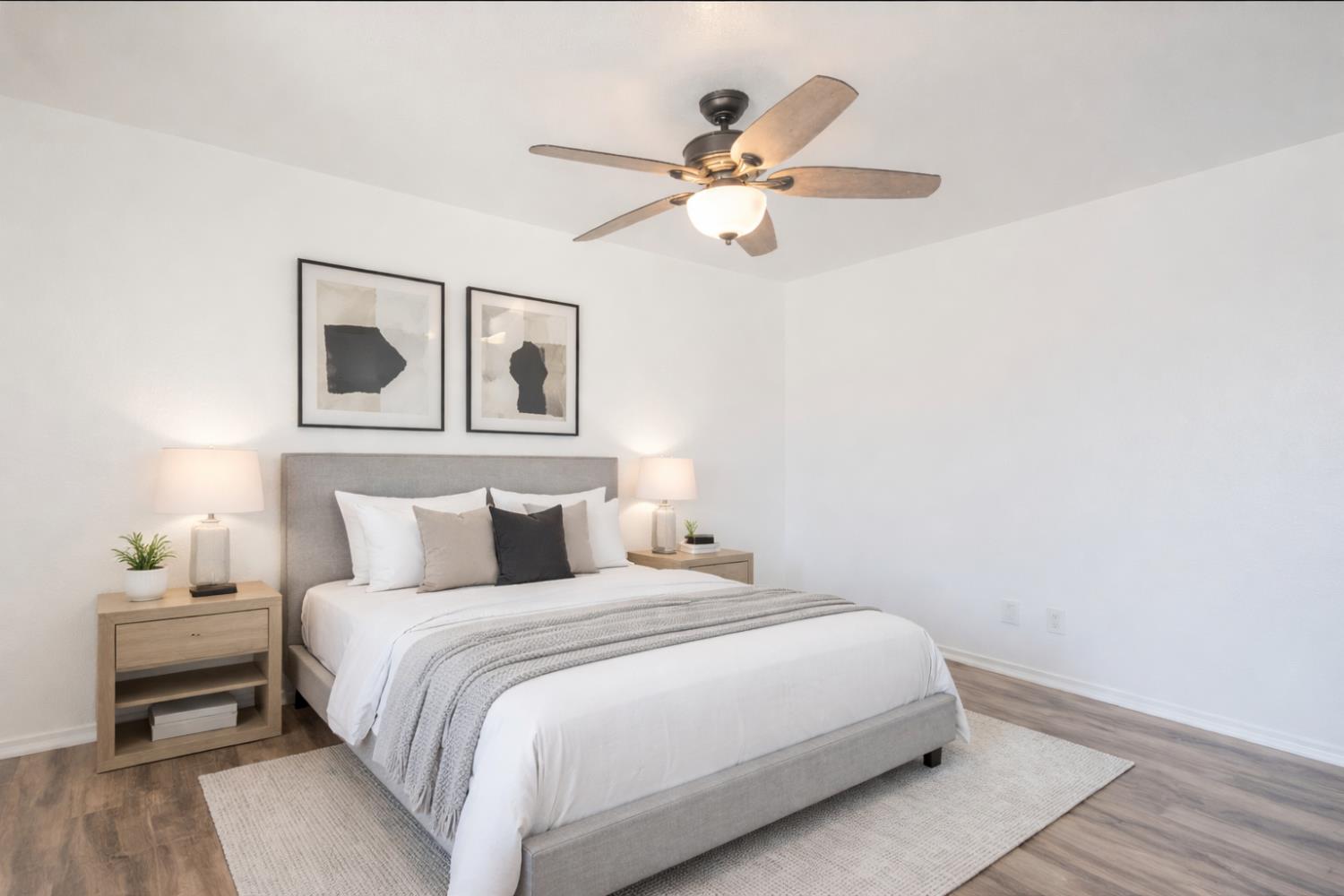 3147 Boulder Avenue Madera, CA 93637 - Photo 22 of 29 a bedroom with a bed and a chandelier