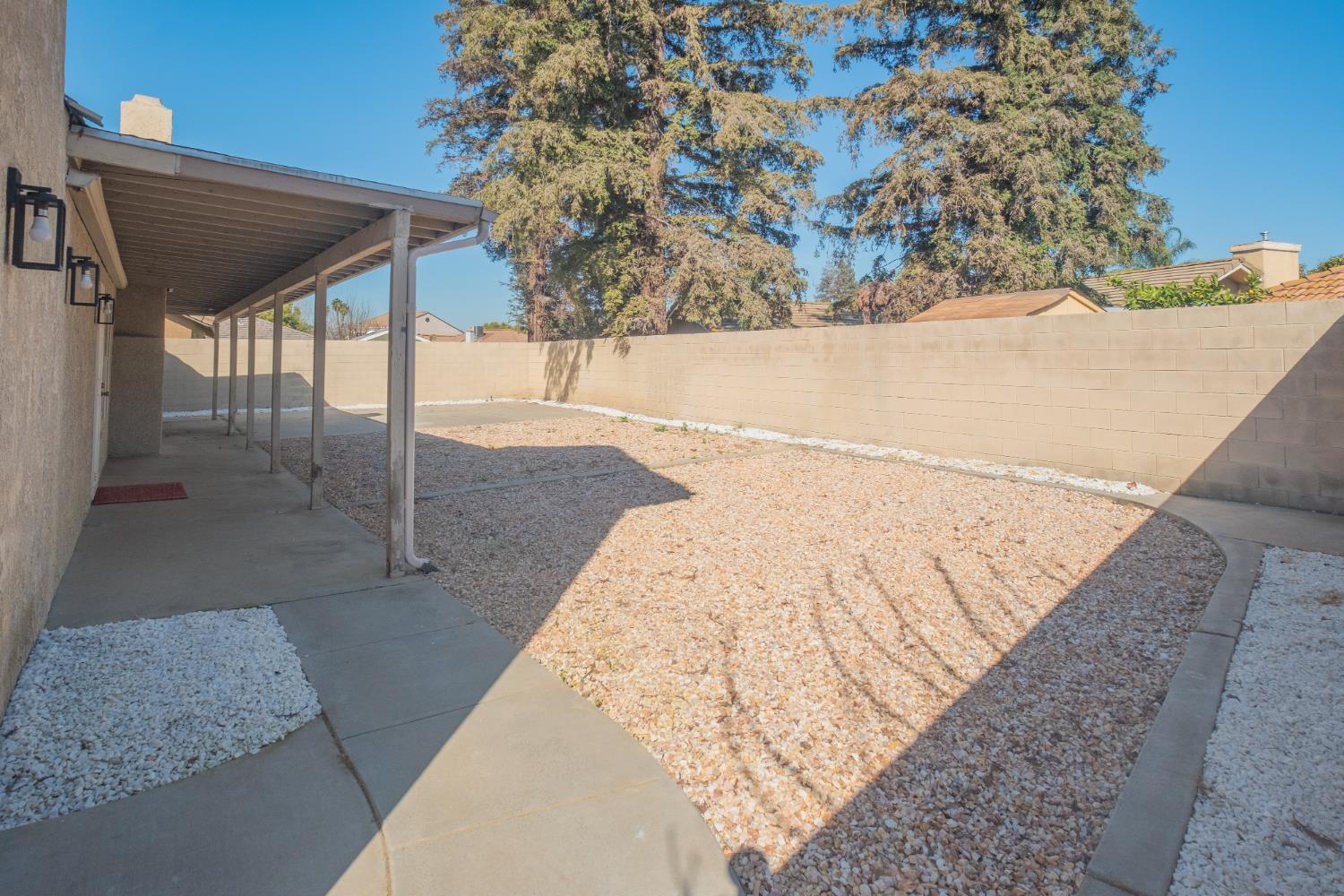3147 Boulder Avenue Madera, CA 93637 - Photo 29 of 29 a view of a backyard of the house