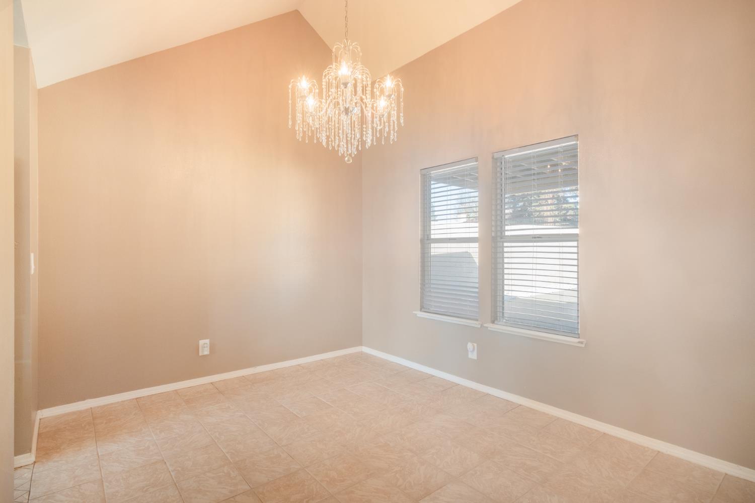 3147 Boulder Avenue Madera, CA 93637 - Photo 5 of 29 a view of an empty room with a window
