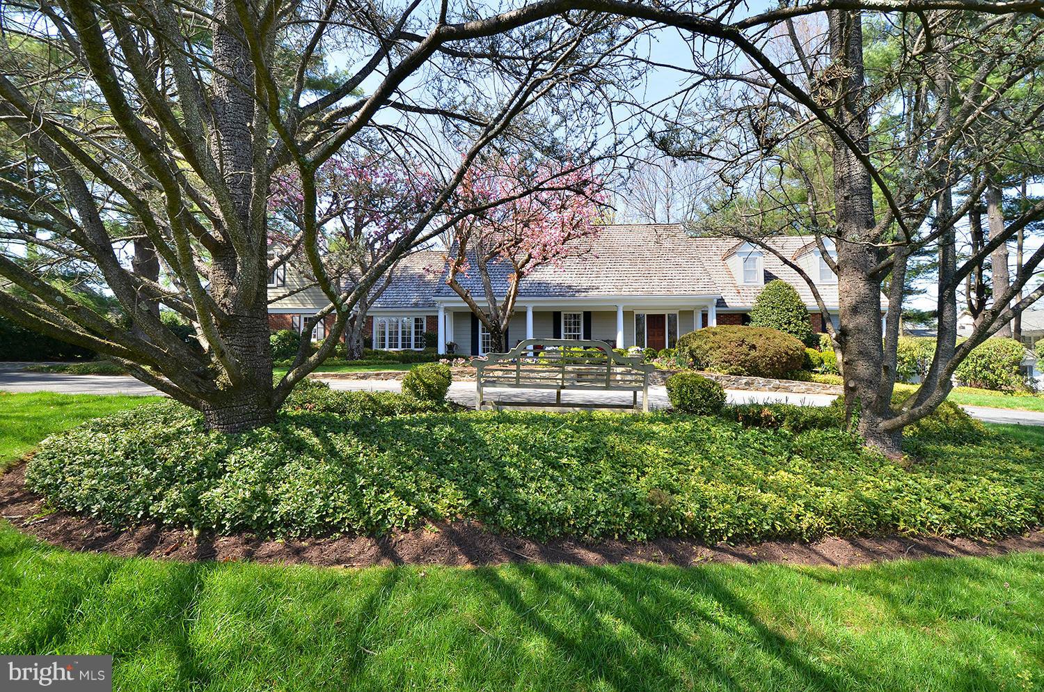 10112 Norton Road Potomac, MD 20854 - Photo 1 of 30 a front view of a house with garden