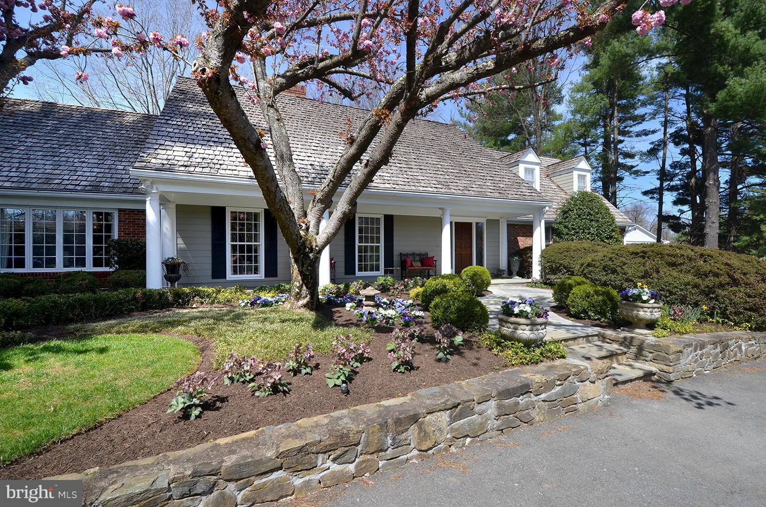 10112 Norton Road Potomac, MD 20854 - Photo 3 of 30 a front view of a house with garden