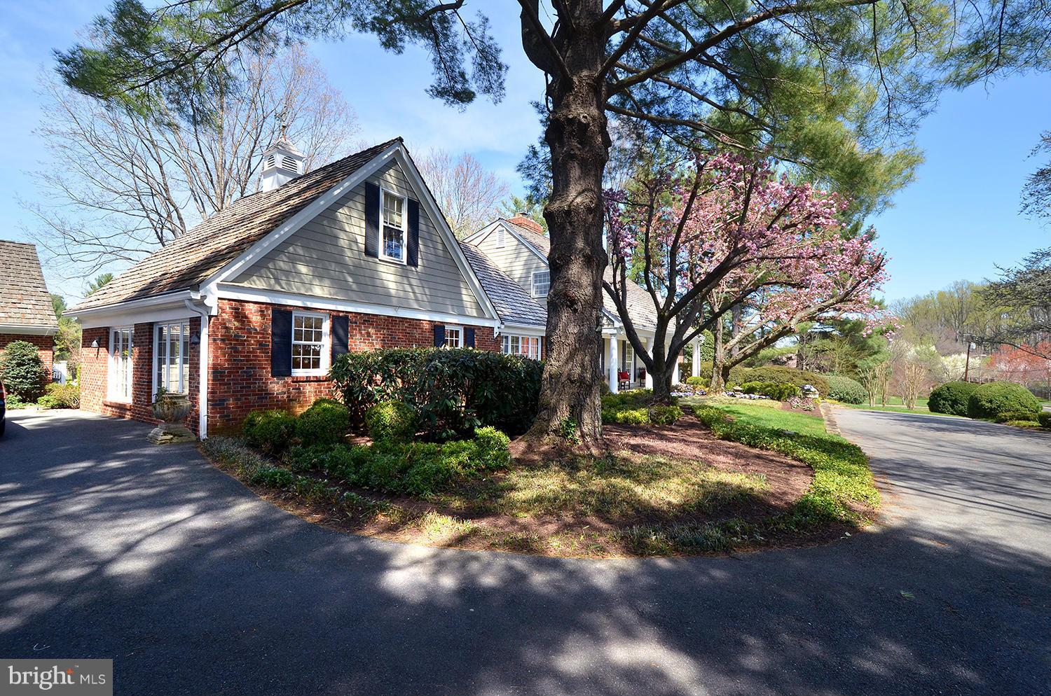 10112 Norton Road Potomac, MD 20854 - Photo 4 of 30 a front view of a house with garden