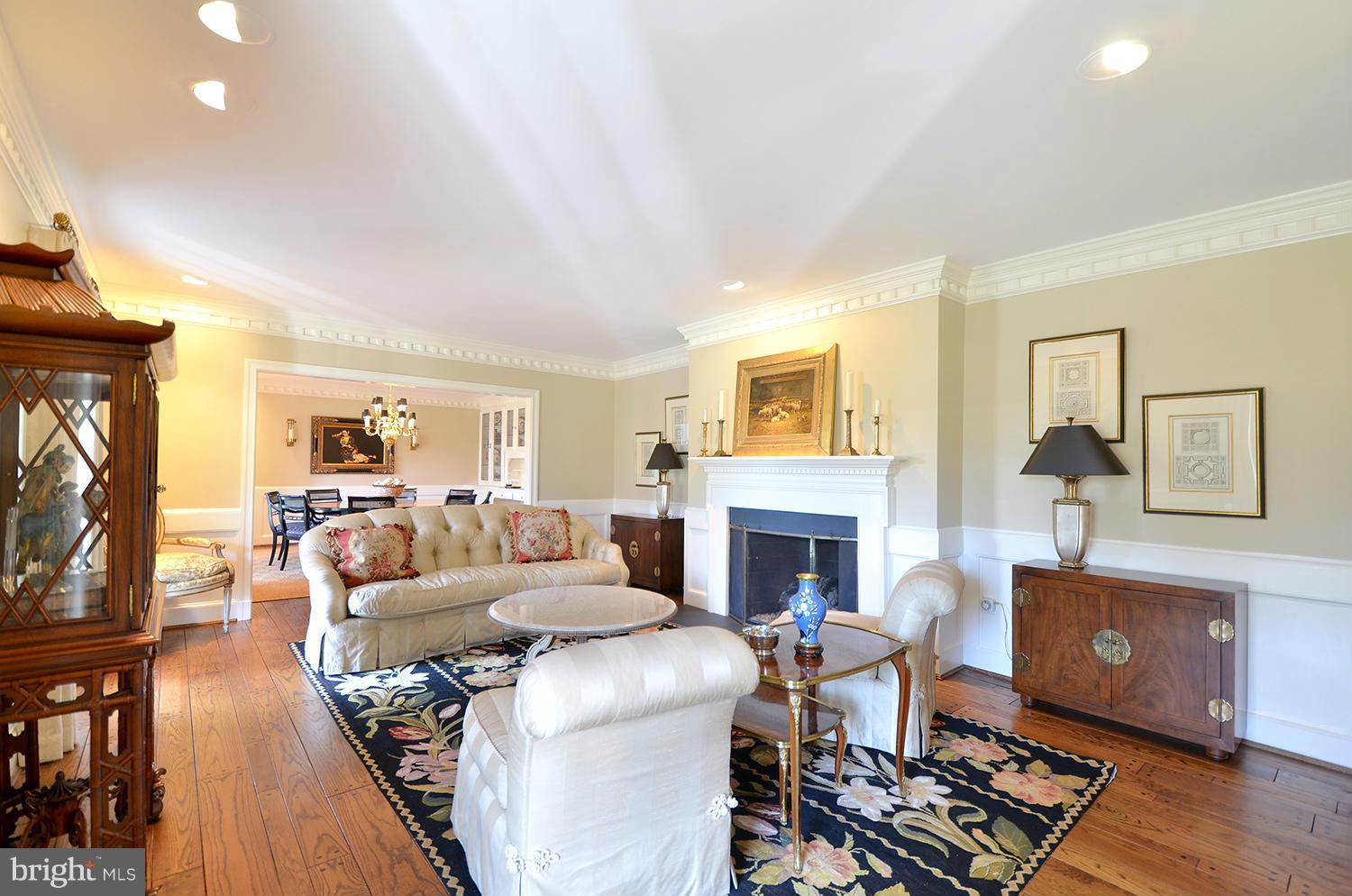 10112 Norton Road Potomac, MD 20854 - Photo 6 of 30 a living room with furniture and a fireplace