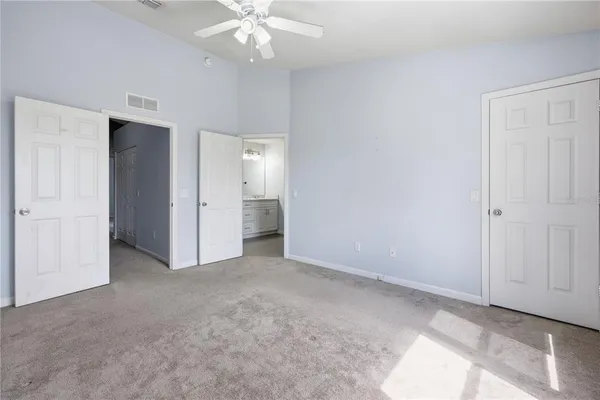 a bathroom with a double vanity sink and mirror