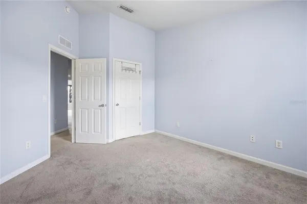 a view of room with window and hardwood floor