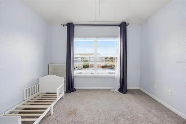 an empty room with a bathroom