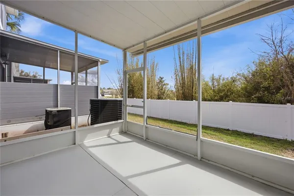 a bathroom with a tub and shower