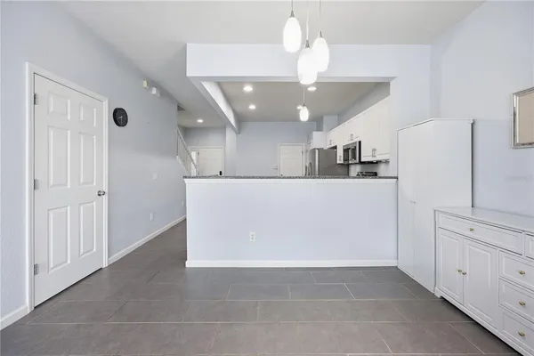a view of a kitchen with an empty space