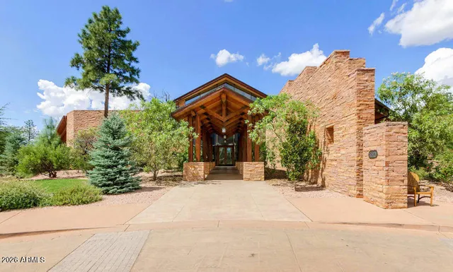 a view of a swimming pool and an outdoor space