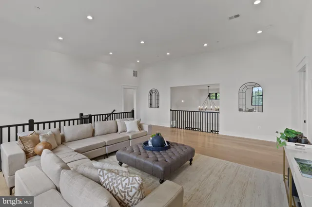 a bathroom with double vanity sink and a mirror