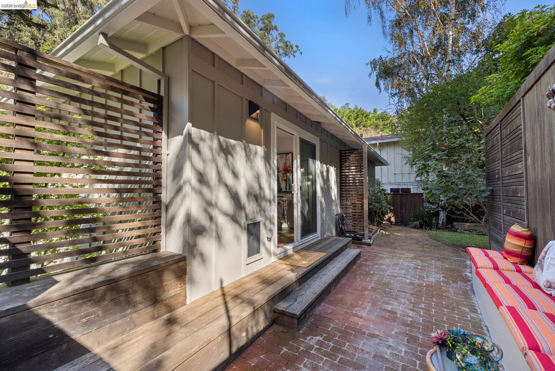 6660 Sobrante Road Oakland, CA 94611 - Photo 43 of 48 Private outdoor patio featuring a brick paver surface