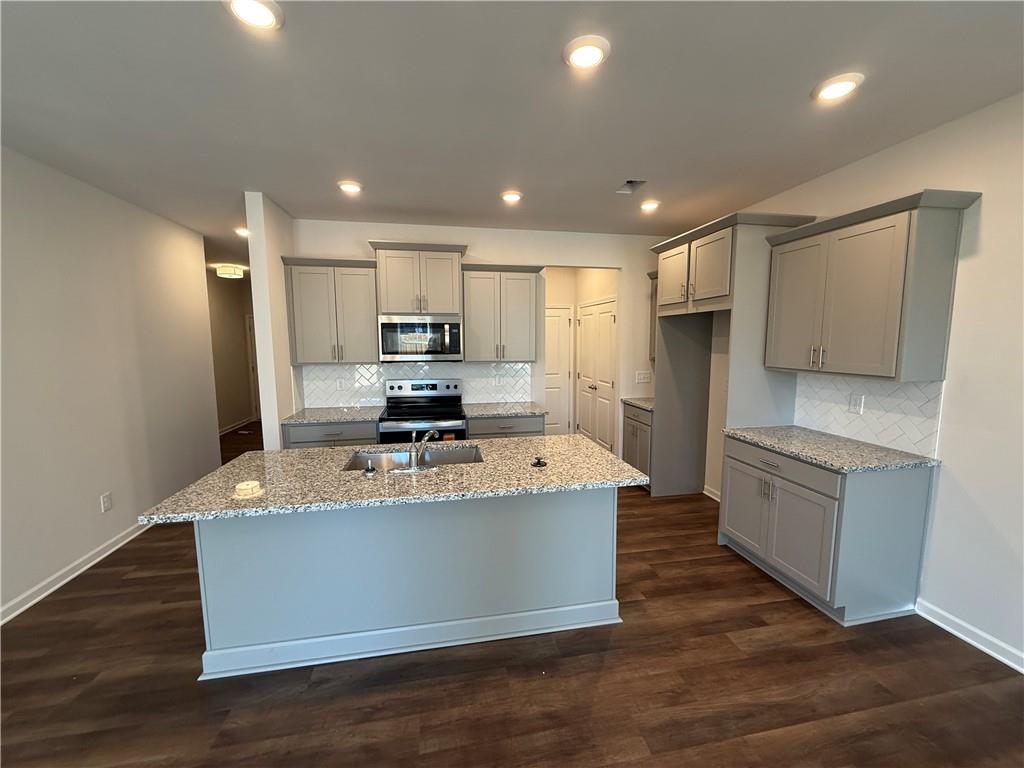 5143 Longview Run Decatur, GA 30035 - Photo 4 of 17 a large kitchen with stainless steel appliances