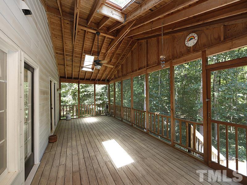 4812 Oak Way Raleigh, NC 27613 - Photo 12 of 18 Absolute privacy on this huge porch for relaxing or entertaining.