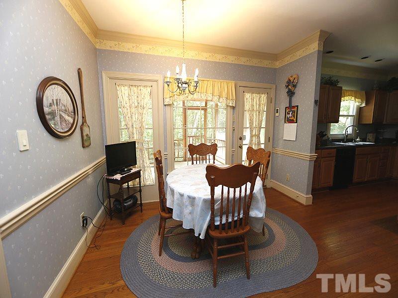 4812 Oak Way Raleigh, NC 27613 - Photo 6 of 18 Great space close to the kitchen and also the screened porch. This house has good flow for entertaining.