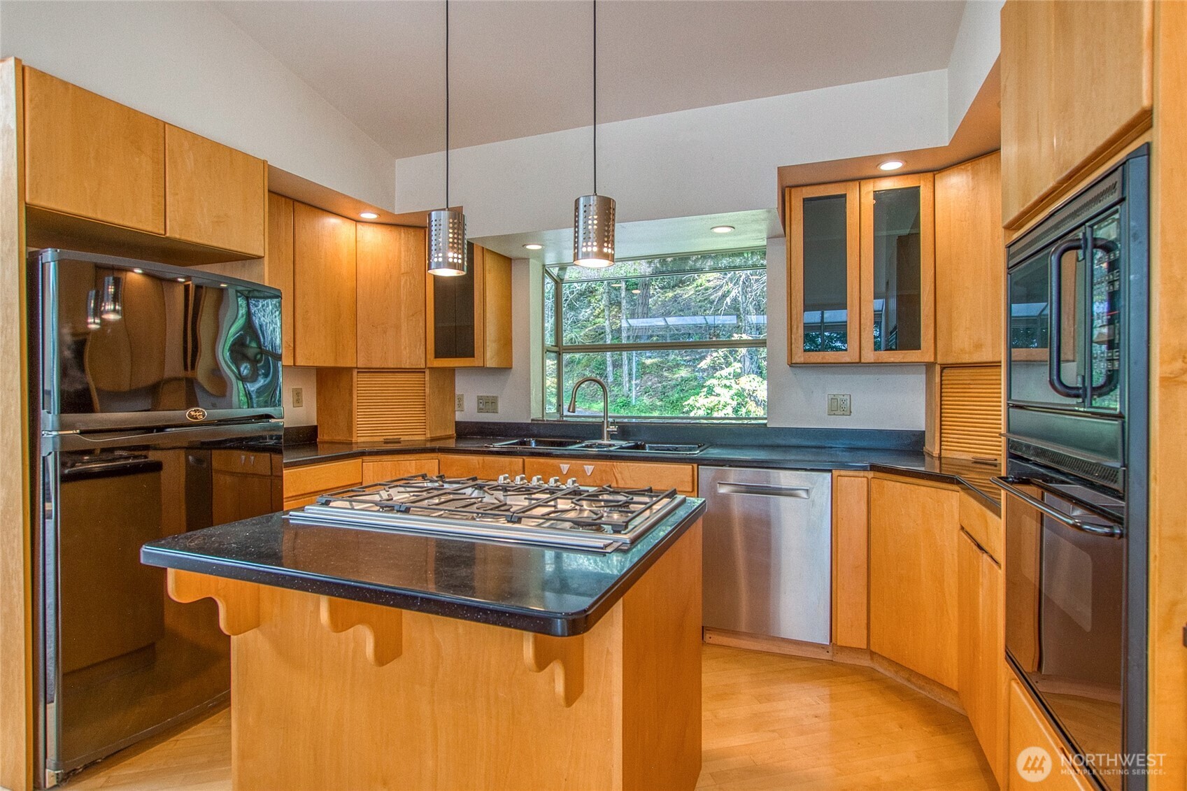 121 Switchback Road Orcas Island, WA 98245 - Photo 15 of 35 a kitchen with stainless steel appliances granite countertop a sink stove and refrigerator