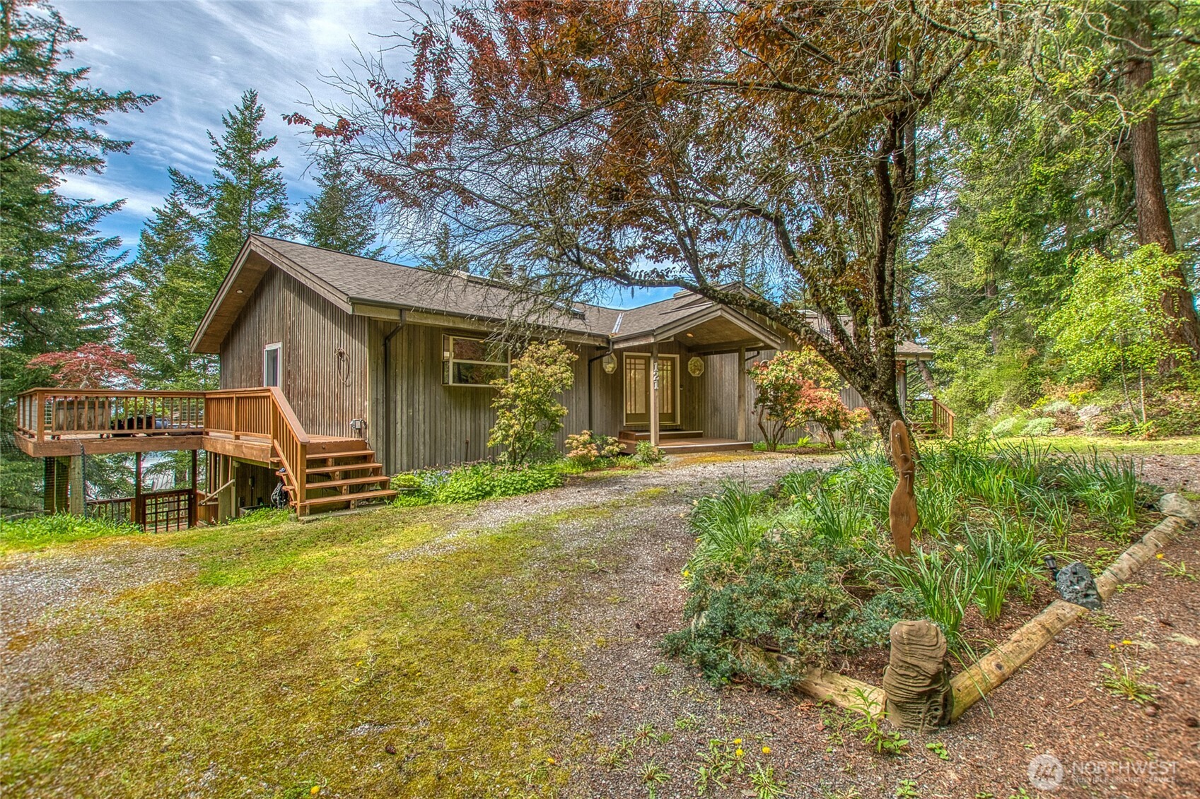 121 Switchback Road Orcas Island, WA 98245 - Photo 2 of 35 a view of a house with backyard and a tree