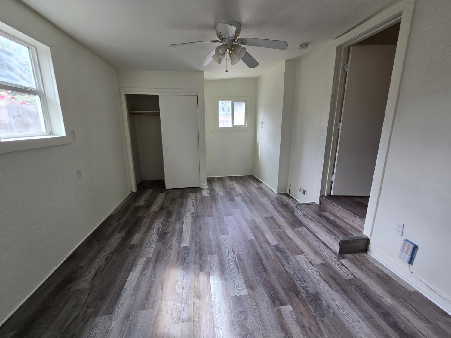 334 Semple Street Modesto, CA 95354 - Photo 13 of 28 a view of entryway with window and wooden floor