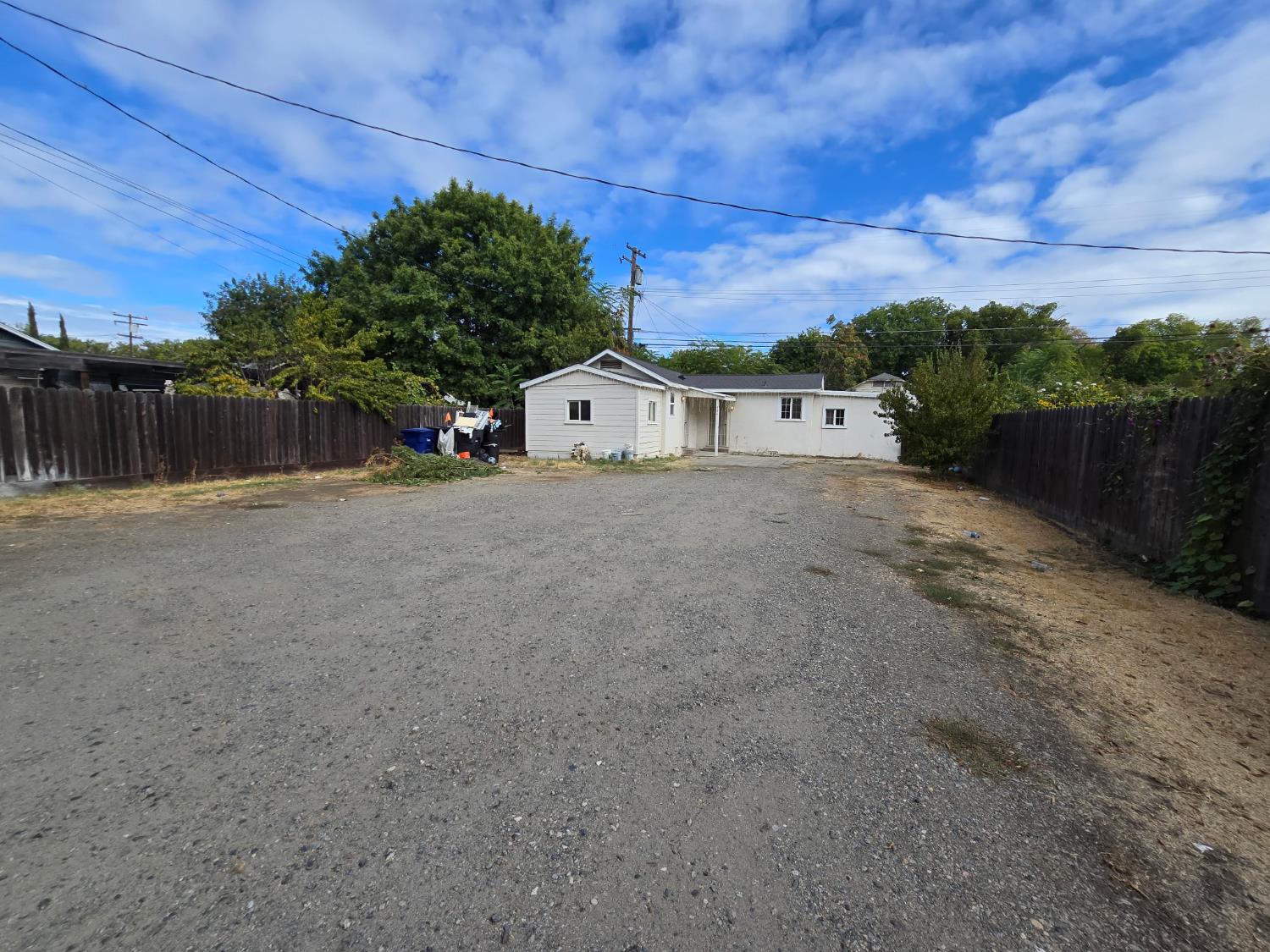 334 Semple Street Modesto, CA 95354 - Photo 4 of 28 a view of a house with a yard