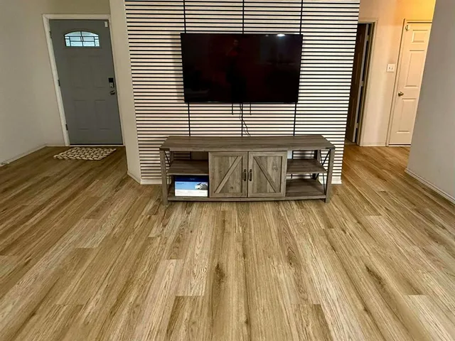 a view of kitchen from the hallway