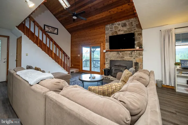 a bedroom with a bed and a lamp