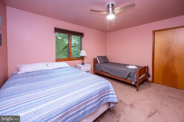 a view of a hallway with staircase