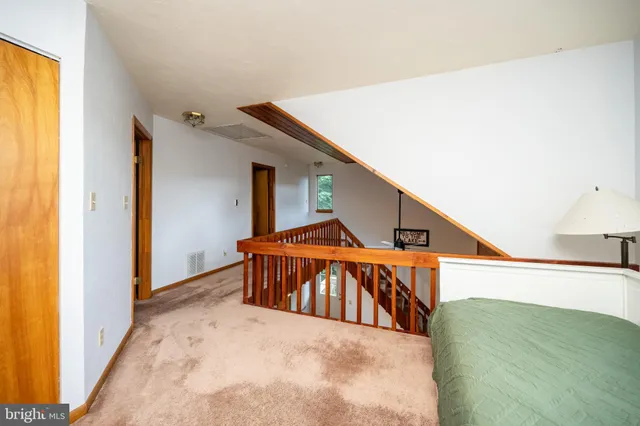 a view of a hardwood & staircase