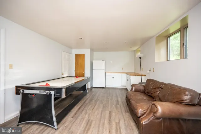 a view of a balcony with furniture