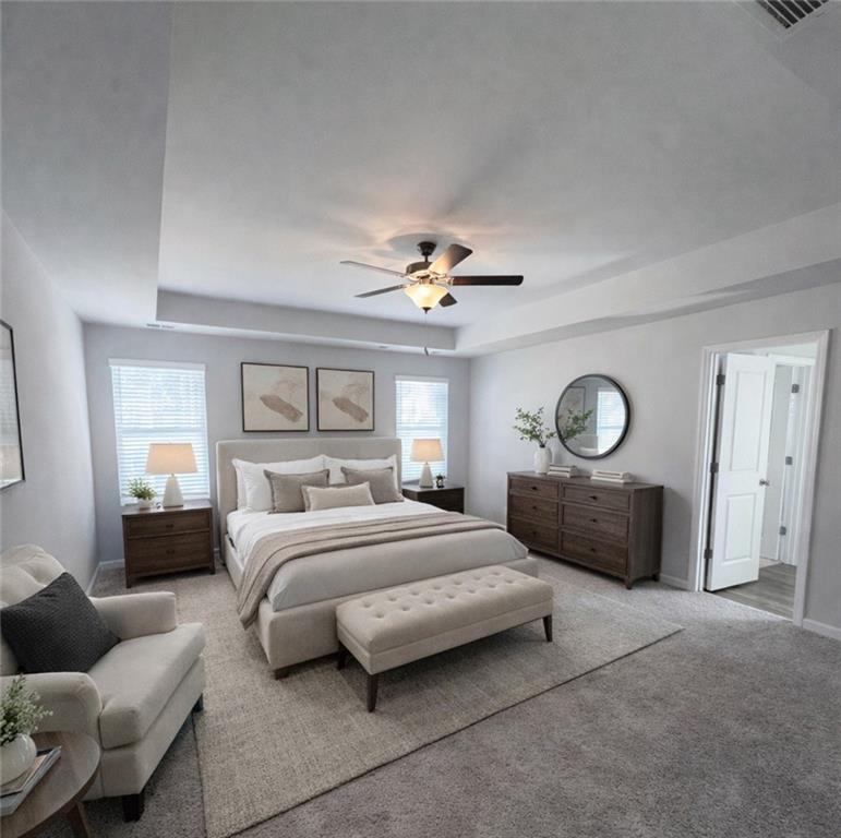 3002 Viewpark Circle Conyers, GA 30013 - Photo 17 of 41 a bedroom with a bed and a chandelier