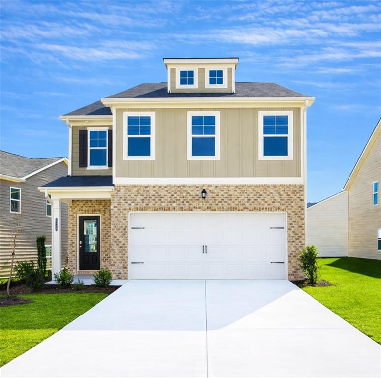 3002 Viewpark Circle Conyers, GA 30013 - Photo 2 of 41 a front view of a house with a yard