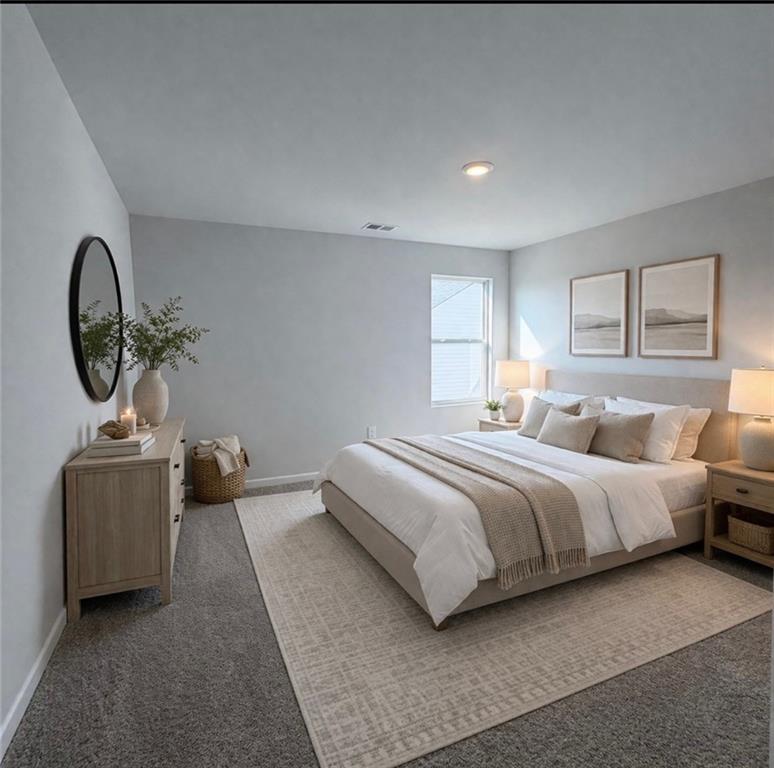 3002 Viewpark Circle Conyers, GA 30013 - Photo 21 of 41 a spacious bedroom with bed and a window