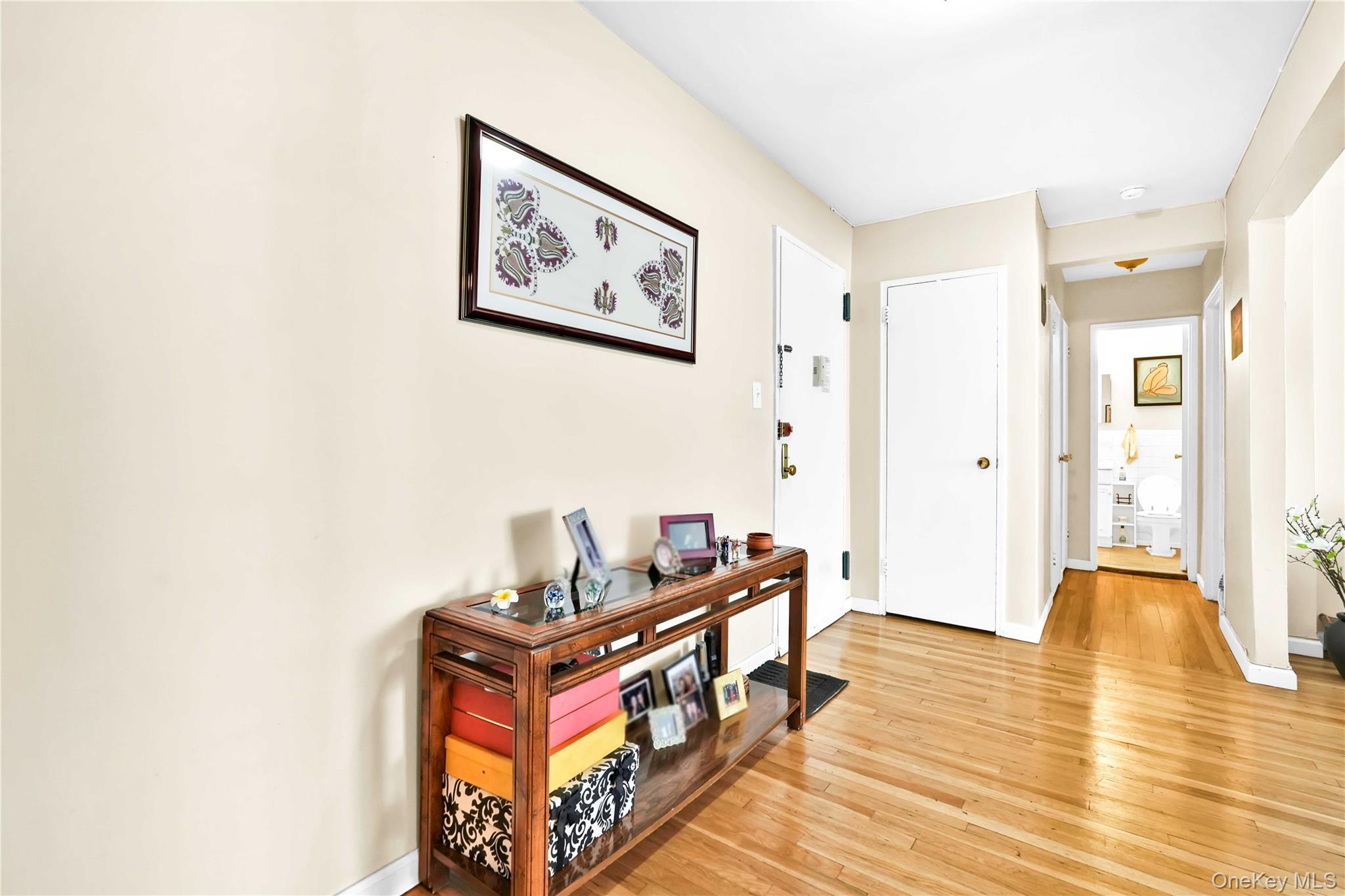 209-10 41st Avenue, Unit 2J Queens, NY 11361 - Photo 18 of 35 a living room with furniture