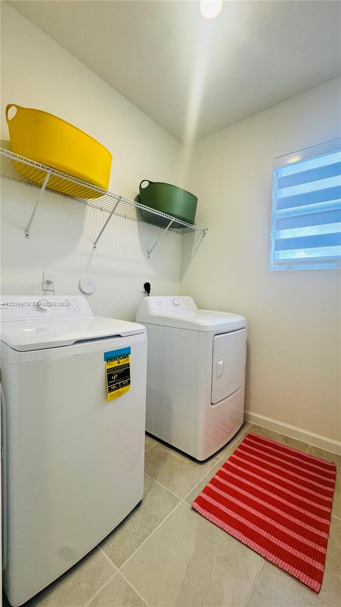 19479 Southwest 340th Street, Unit 1 Homestead, FL 33034 - Photo 13 of 58 a utility room with dryer and washer