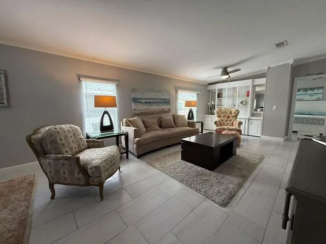 a living room with furniture and a couch