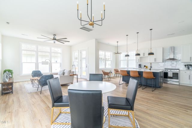a view of a livingroom with furniture and window