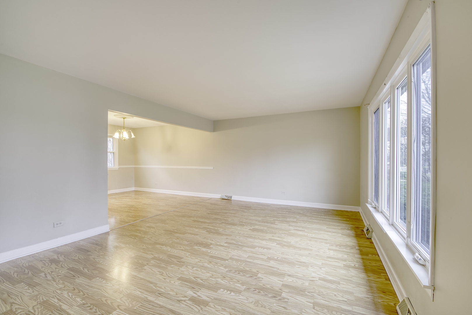 403 Northgate Road Lindenhurst, IL 60046 - Photo 3 of 22 a view of an empty room and window