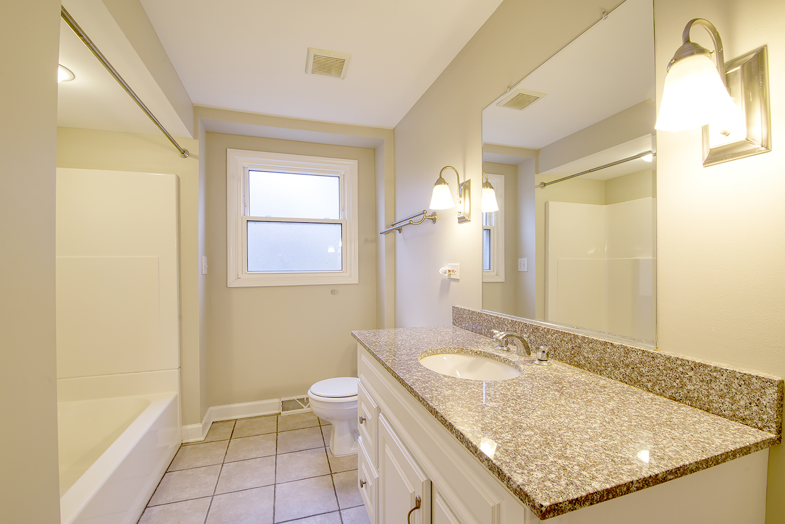 403 Northgate Road Lindenhurst, IL 60046 - Photo 8 of 22 a bathroom with a granite countertop sink and a mirror