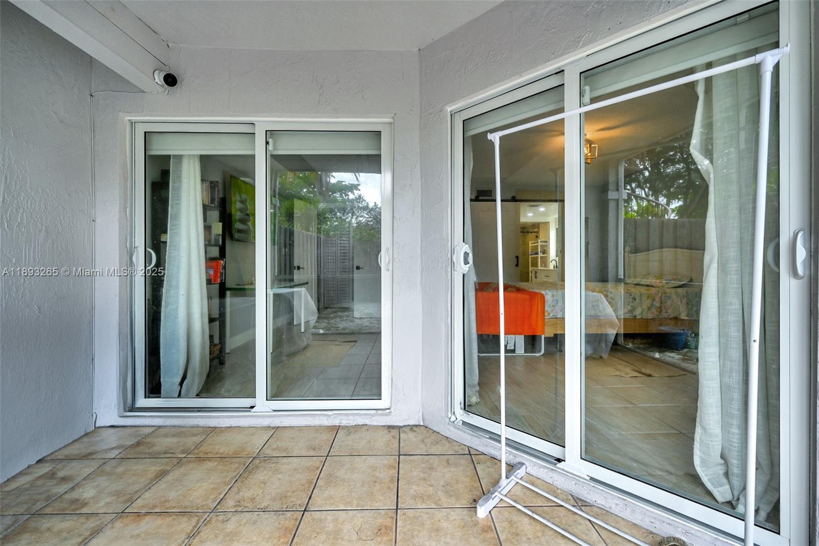 10101 Southwest 154th Cir Court, Unit 10711 Miami, FL 33196 - Photo 18 of 63 a view of backyard from window