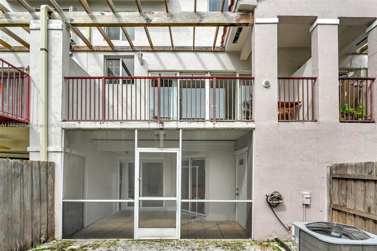 10101 Southwest 154th Cir Court, Unit 10711 Miami, FL 33196 - Photo 24 of 63 a view of a house with a porch