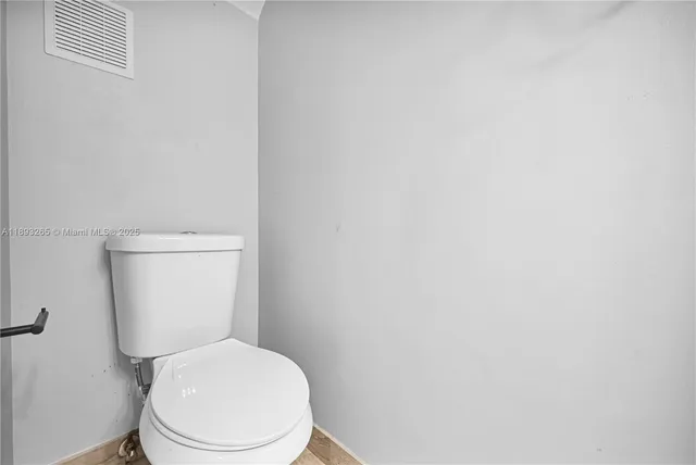 a kitchen with a refrigerator stove and sink