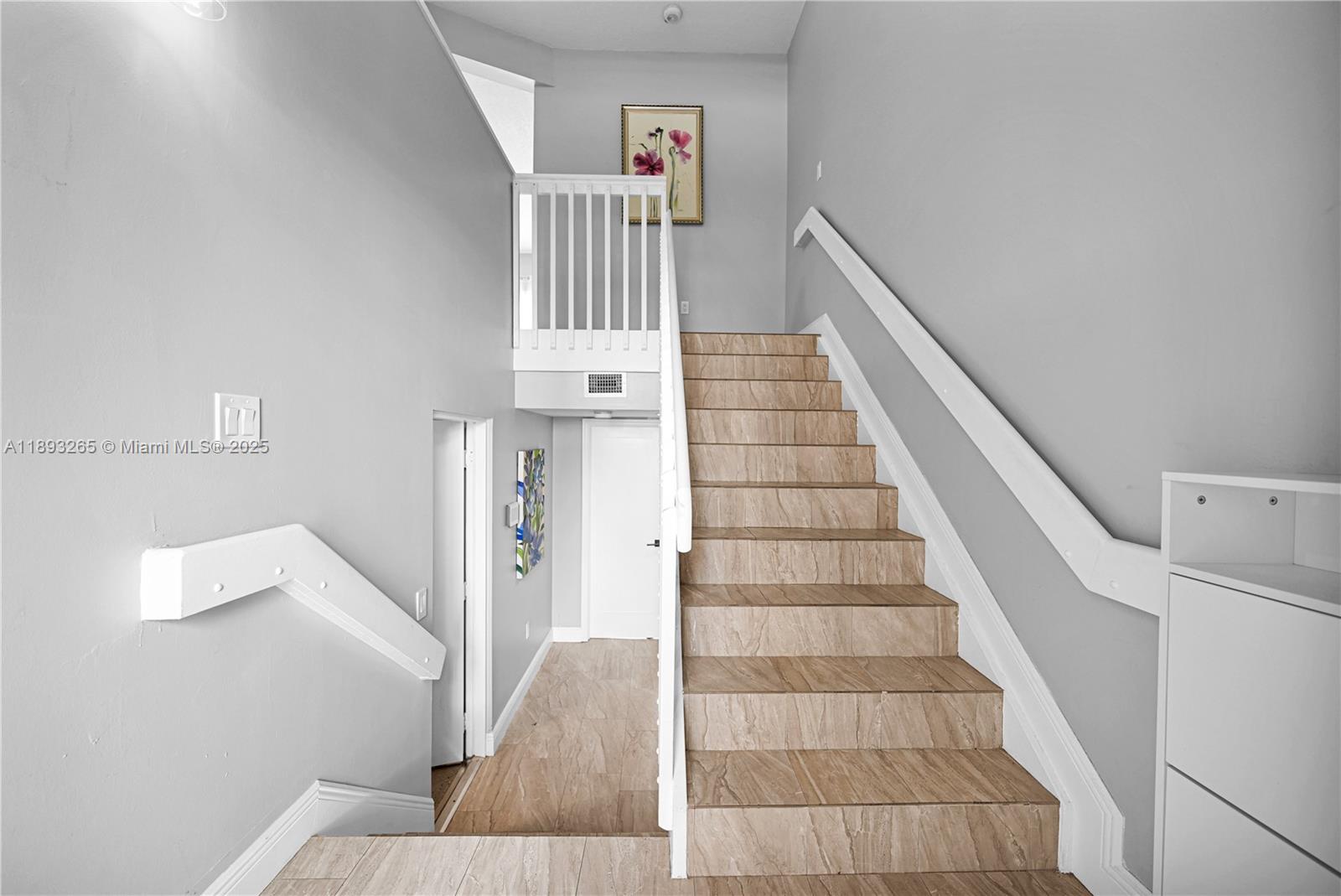 10101 Southwest 154th Cir Court, Unit 10711 Miami, FL 33196 - Photo 3 of 63 a view of entryway and hall with wooden floor