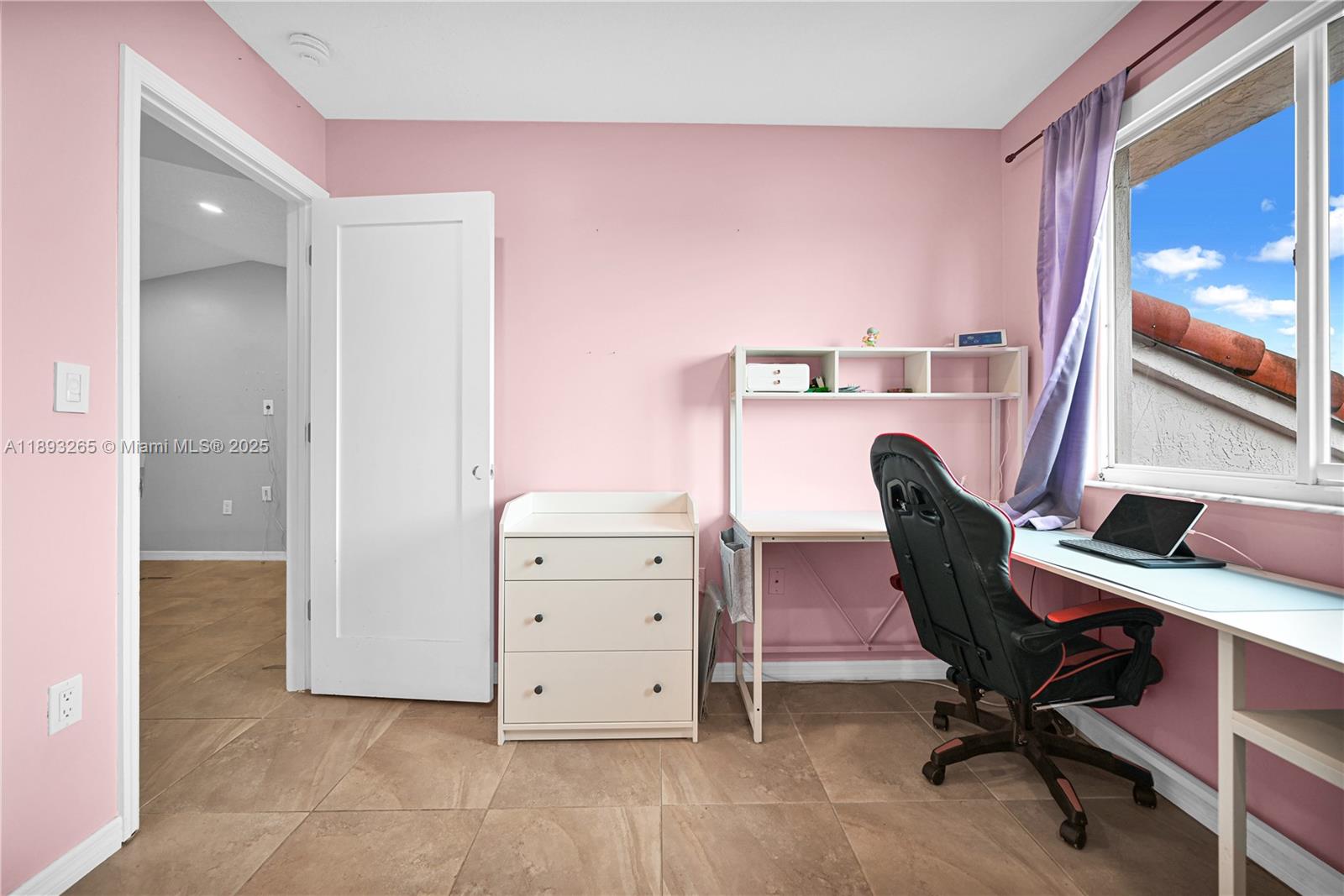 10101 Southwest 154th Cir Court, Unit 10711 Miami, FL 33196 - Photo 46 of 63 a view of a workspace with furniture