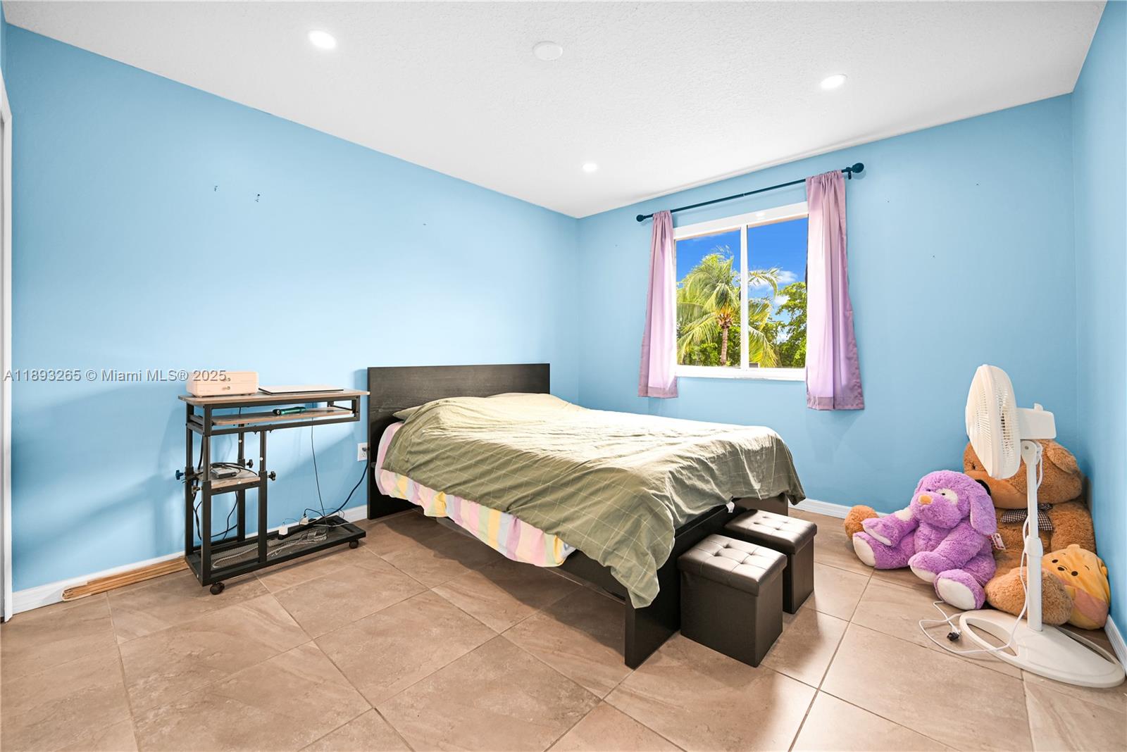 10101 Southwest 154th Cir Court, Unit 10711 Miami, FL 33196 - Photo 48 of 63 a spacious bedroom with a bed and a window