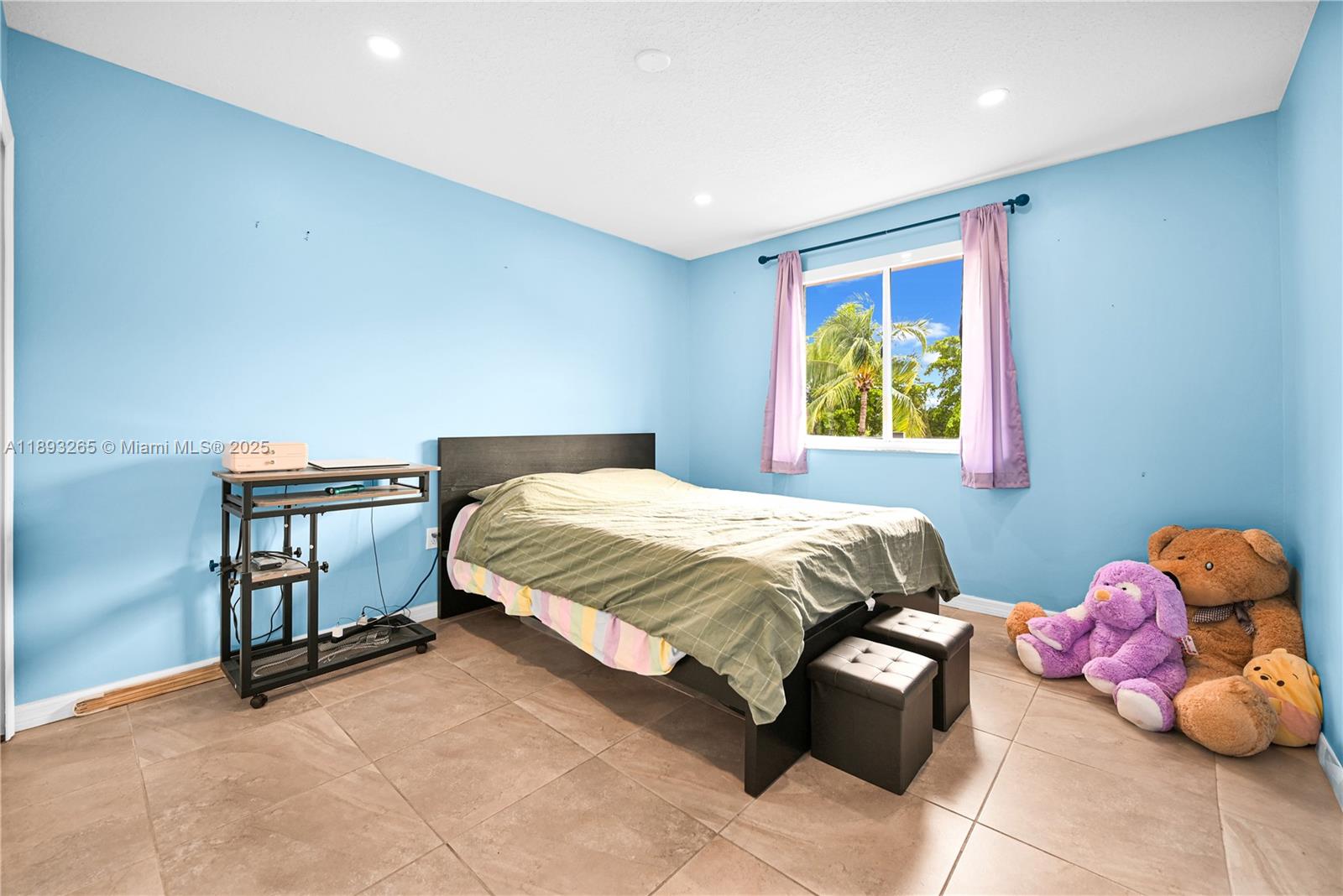 10101 Southwest 154th Cir Court, Unit 10711 Miami, FL 33196 - Photo 49 of 63 a bedroom with a bed and a window