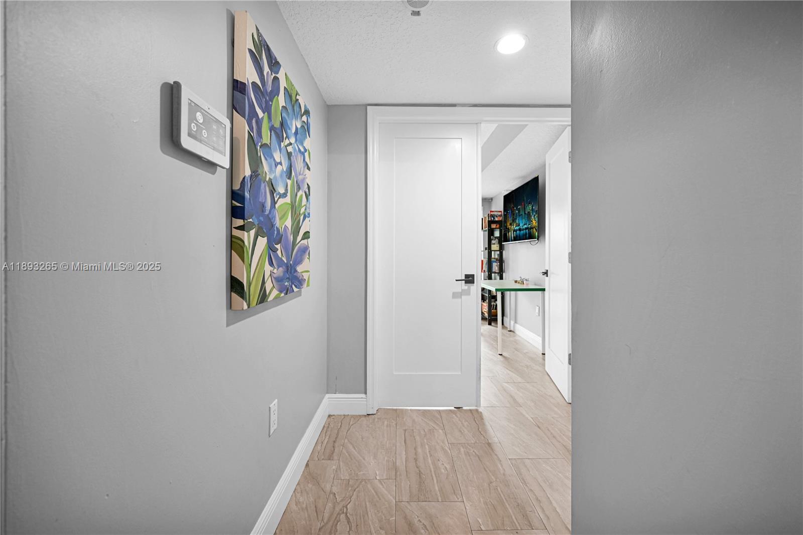 10101 Southwest 154th Cir Court, Unit 10711 Miami, FL 33196 - Photo 5 of 63 a view of a hallway with workspace