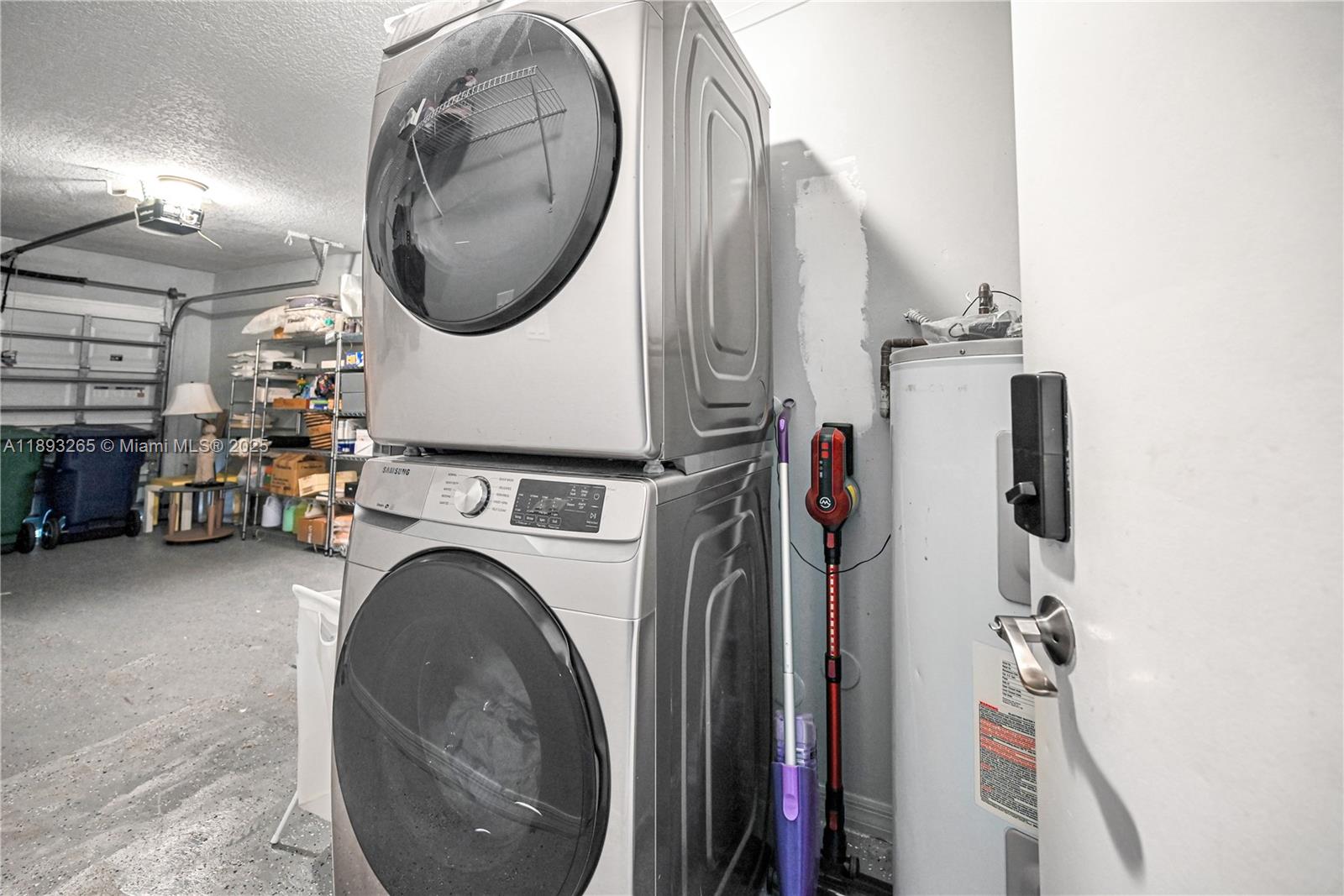 10101 Southwest 154th Cir Court, Unit 10711 Miami, FL 33196 - Photo 60 of 63 a utility room with dryer and washer