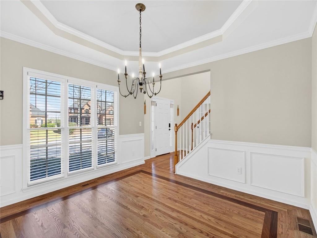 8840 Appling Ridge Cumming, GA 30041 - Photo 11 of 87 a view of an entryway with wooden floor