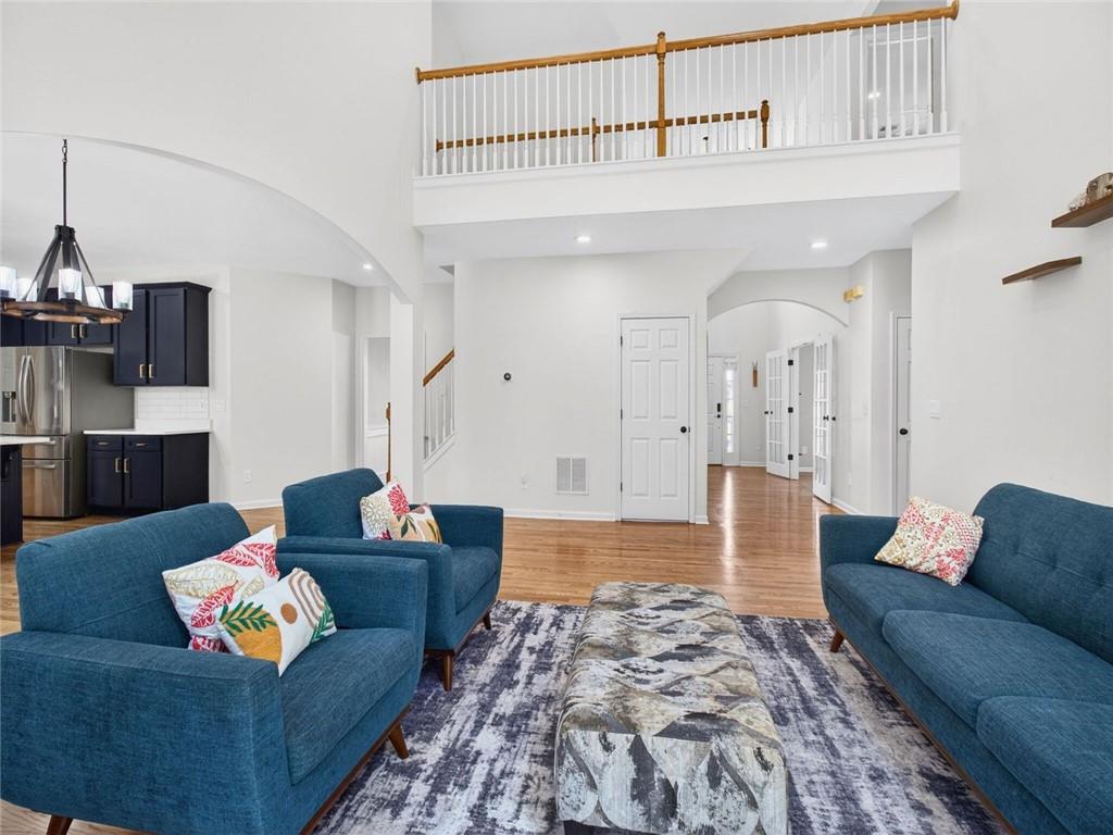 8840 Appling Ridge Cumming, GA 30041 - Photo 22 of 87 a living room with furniture and a rug